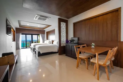 Deluxe Triple Room with Ocean View — Anona Sunset Boutique